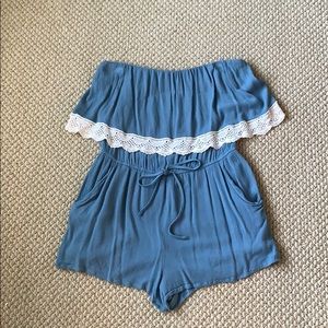 Blue sleeveless romper with pockets